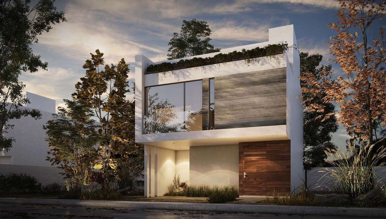 Fachada de una casa contemporánea de dos niveles al atardecer, con celosía de madera, muro de concreto y luz cálida en el interior.